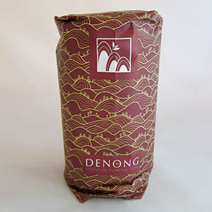 Bag with 10 tea cakes with 'Denong' branding on a white background