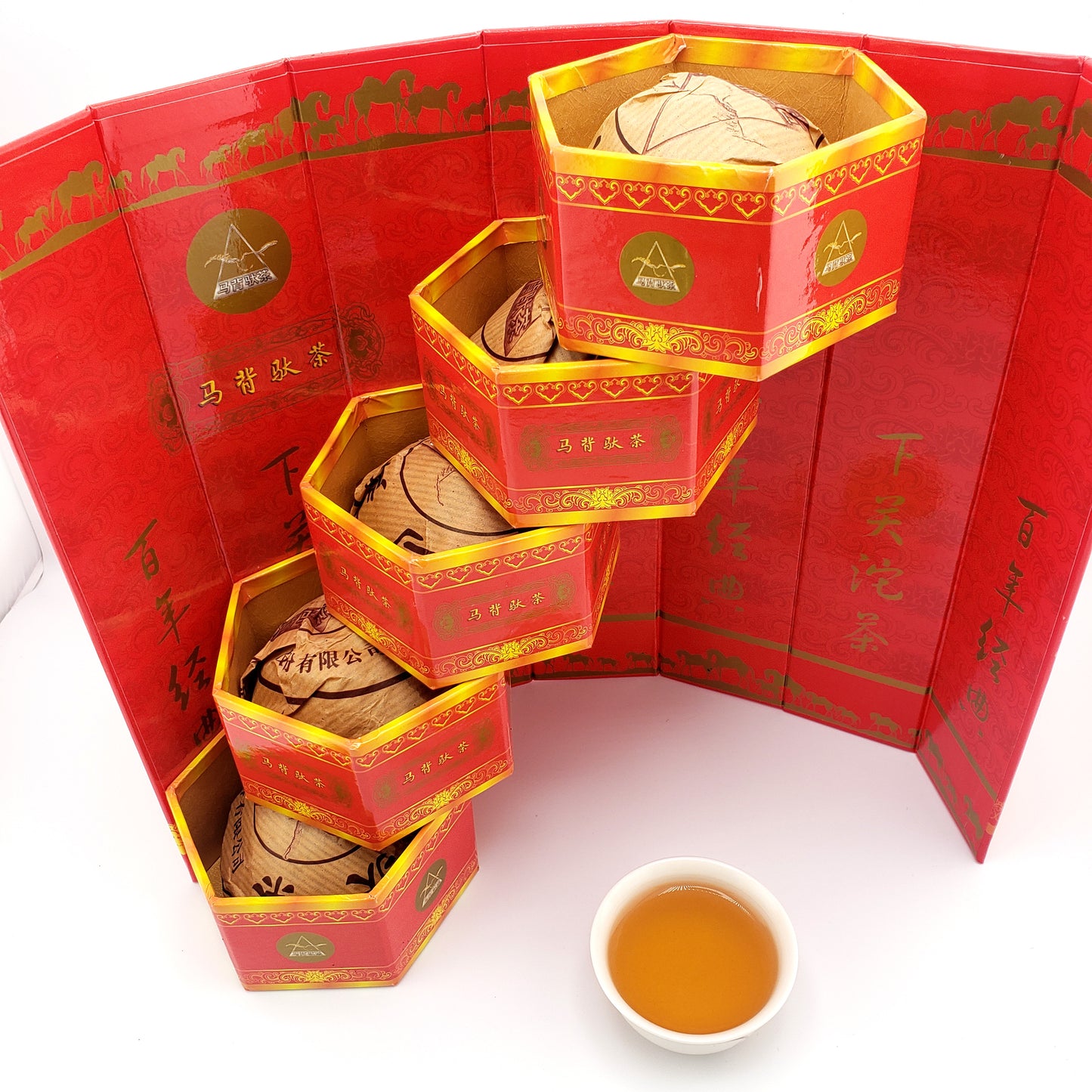 Set of 5 pressed tuo cha raw pu-erh in a display pack