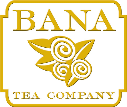 Logo of Bana Tea Company with gold text and decorative elements on a white background