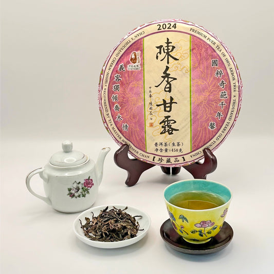 Tea packaging with a teapot, cup, and tea leaves on a white background