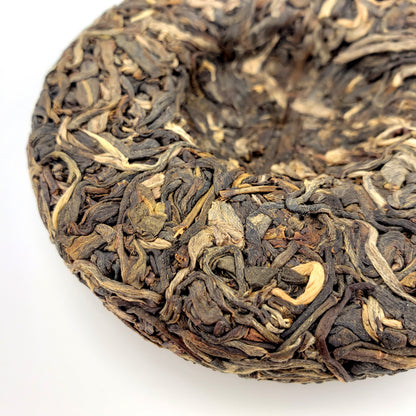 Close-up of pressed tea cake on a white background