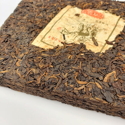 Pressed Pu-erh tea brick with nei fei label