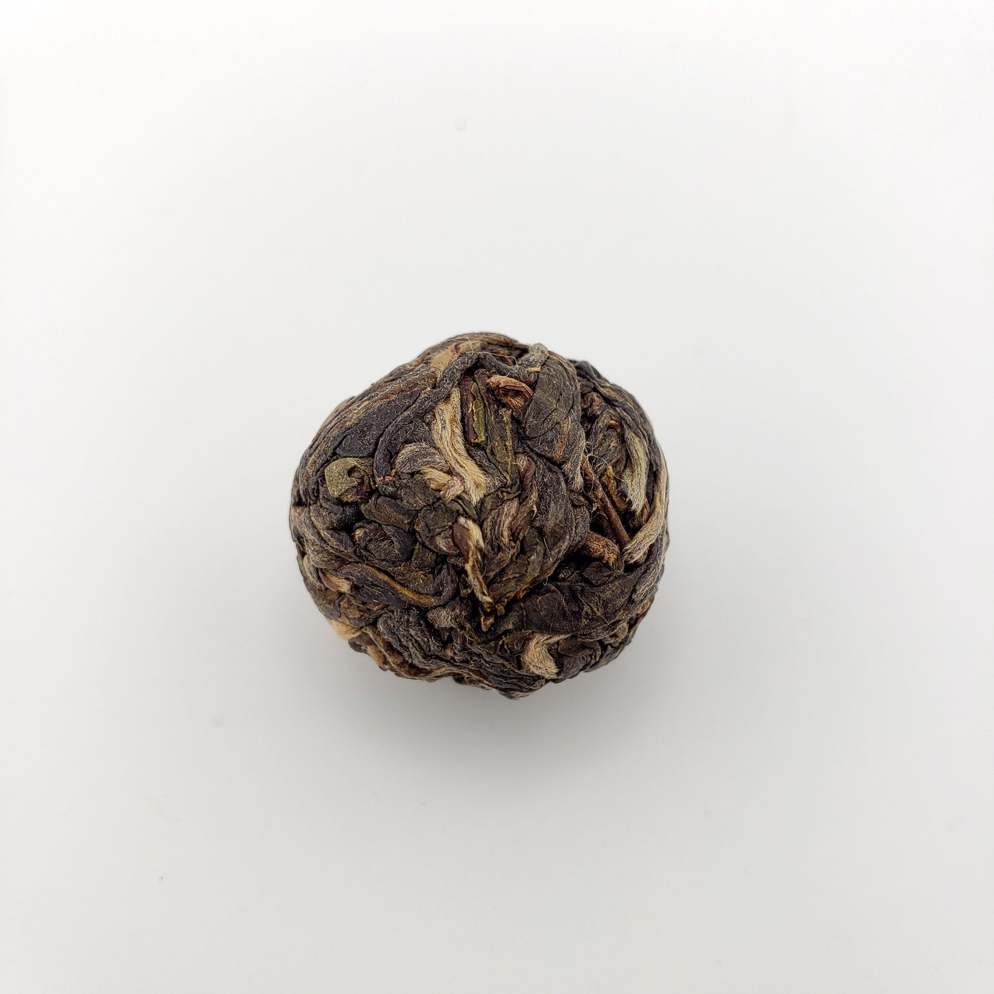 Tea ball on a white background
