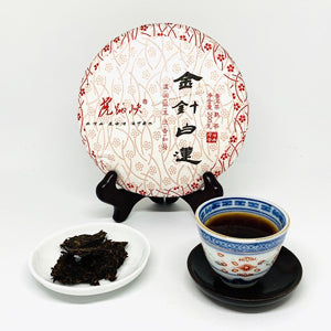 Tea cake with a cup of tea on a white background